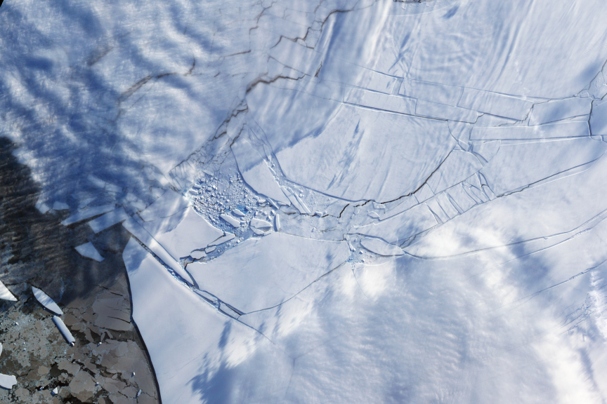 If Paris Agreement targets are not met, the collapse of melting Antarctic ice shelves – like the Wilkins Ice Shelf in 2009 – could cause catastrophic global sea level rise in the second half of the century. Image: NASA