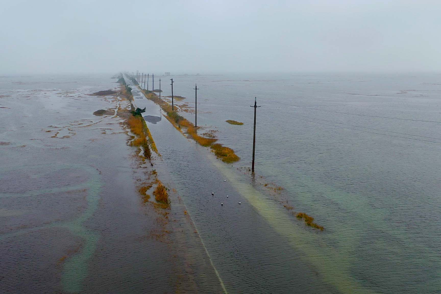A flooded Great Bay Blvd in Little Egg Harbor Twp, NJ. This road serves as the lone vehicular access to the Rutgers Marine Field Station. Photo: Rob Auermuller