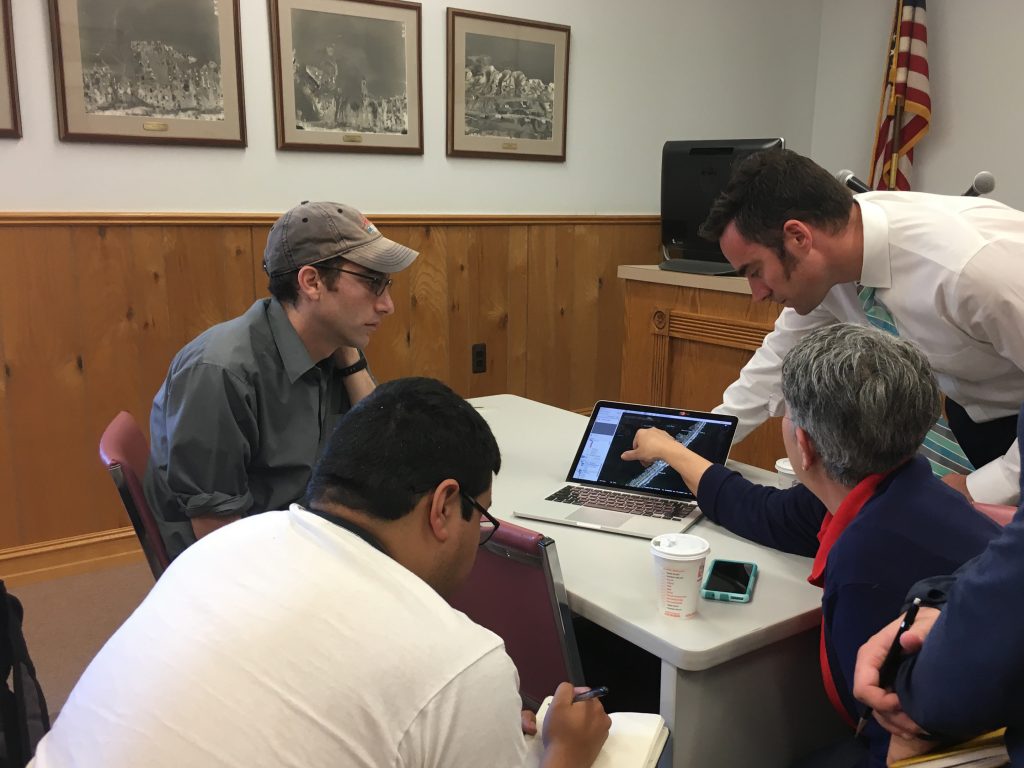 Rutgers professor Robert Kopp (at upper left) leads his students in the C2R2 program on a visit with police and floodplain municipal leaders at Harvey Cedars on Long Beach Island. Photo: Lucia Mostello