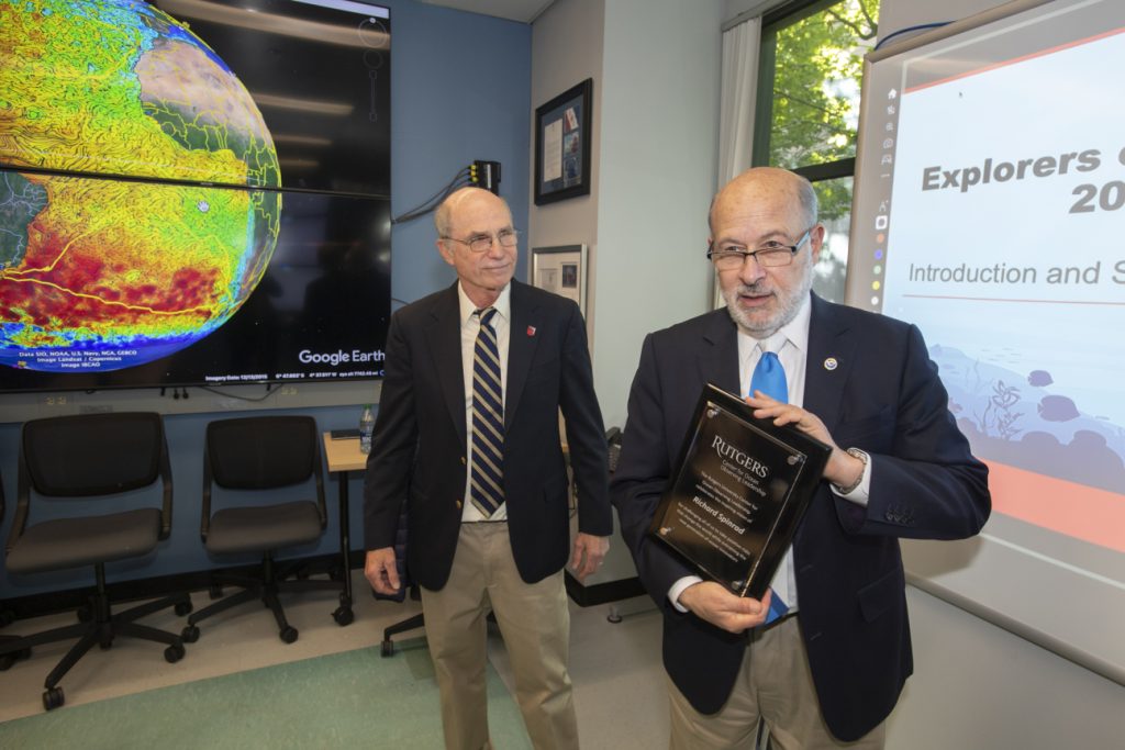 NOAA Administrator Rick Spinrad (r.) receives a special recognition award from Scott Glenn, RUCOOL co-director and Department of Marine and Coastal Sciences Distinguished Professor, during a celebration marking the university’s excellence in ocean research and education over the last 30 years. Photo credit: Nick Romanenko.