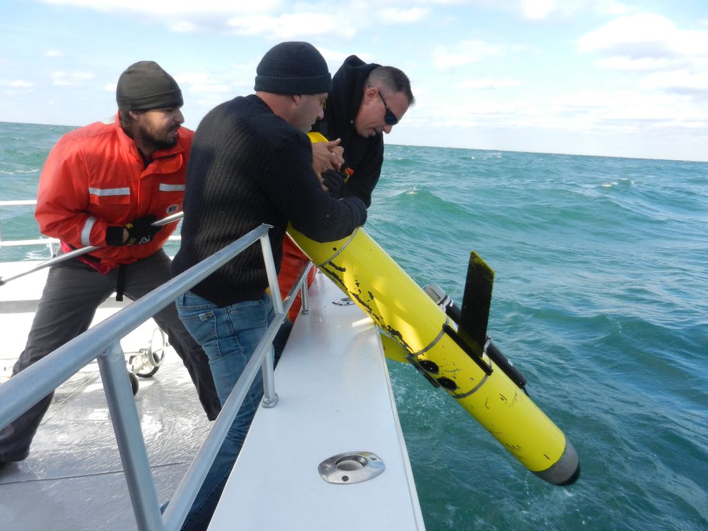 The crew recovers the ocean glider two weeks post-Sandy. Courtesy of Travis Miles